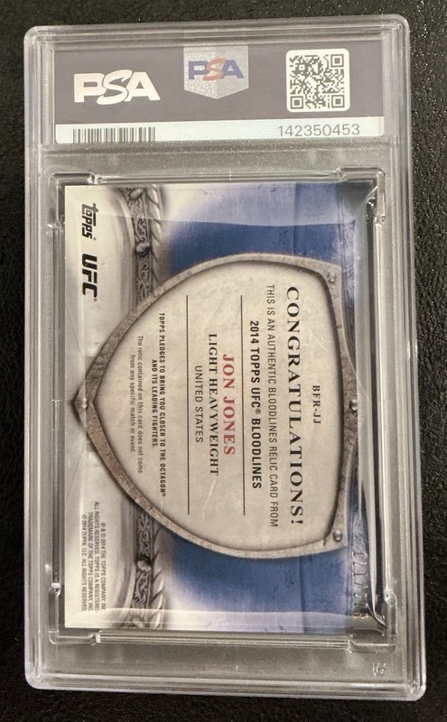 2014 Topps UFC Bloodlines - Fighter Relics - Jon Jones #BFR-JJ - 121/208 - PSA 8 view 2