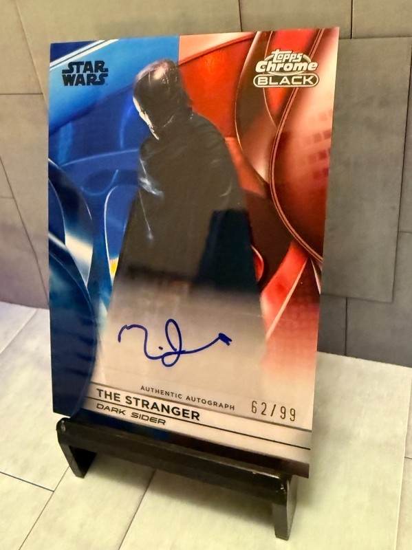 2025 Topps Star Wars Smugglers Outpost The Stranger Chrome Black Autograph #/99 view 2