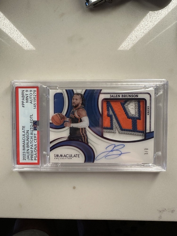 2023 IMMACULATE JALEN BRUNSON GAME USED LOGO PATCH AUTO 3/3 = 1/1 PSA 9 KNICKS