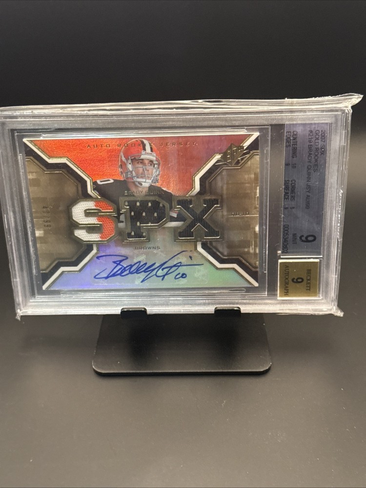 2007 SPX BGS 9 - Brady Quinn #219 - Auto Rookie Jersey Gold #’d/99 RC 