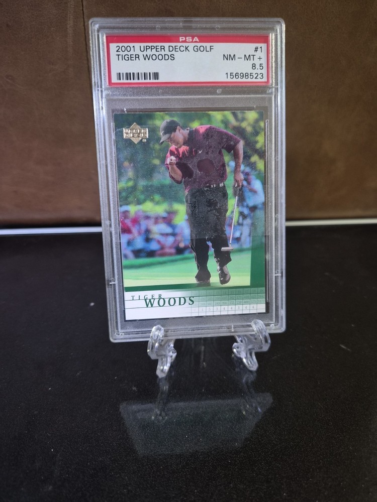 2001 Upper Deck Tiger Woods #1 (RC) PSA 8.5 NM-MT Rookie Card view 1