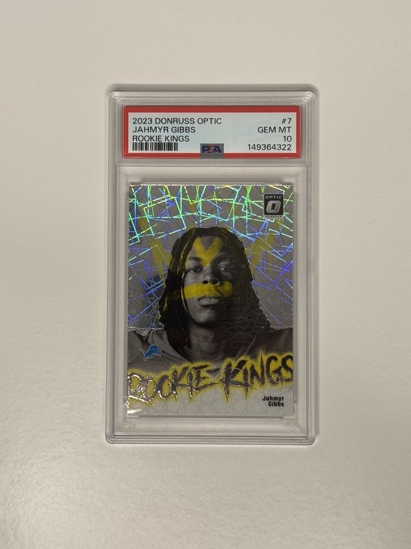2023 Panini Donruss  Optic Jahmyr Gibbs PSA 10 #7 ROOKIE KINGS PRIZM RC SP 