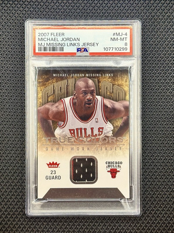 2007 Fleer  - Michael Jordan Missing Links Game-Worn Jersey Patch PSA 8