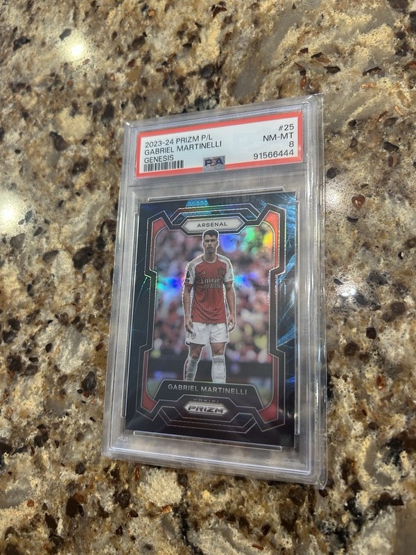 2023/24 Panini Prizm Genesis Case Hit SP Arsenal Gabriel Martinelli PSA 8