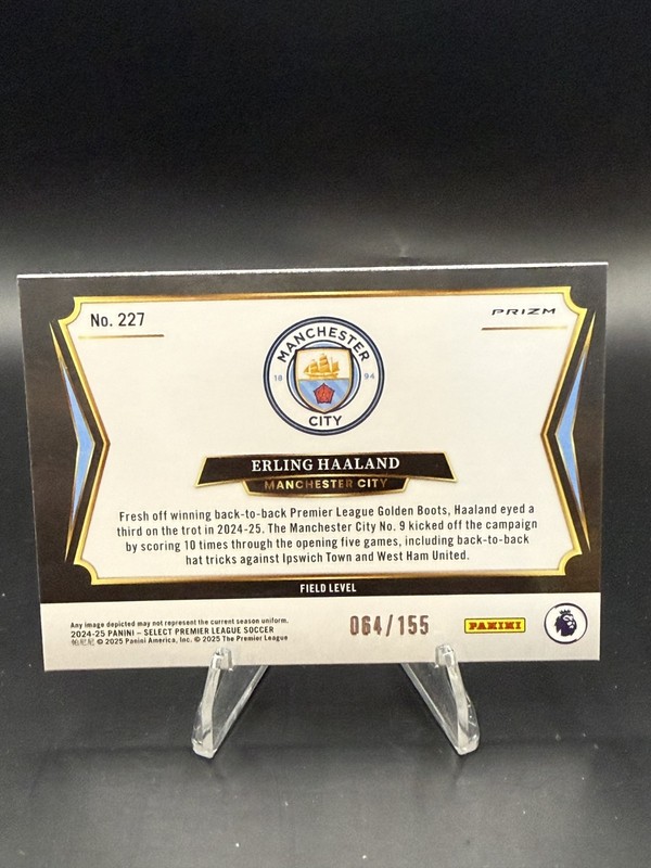 Erling Haaland #227 2024-25 Panini Field Level Orange Ice Prizm Man City 64/155 view 2