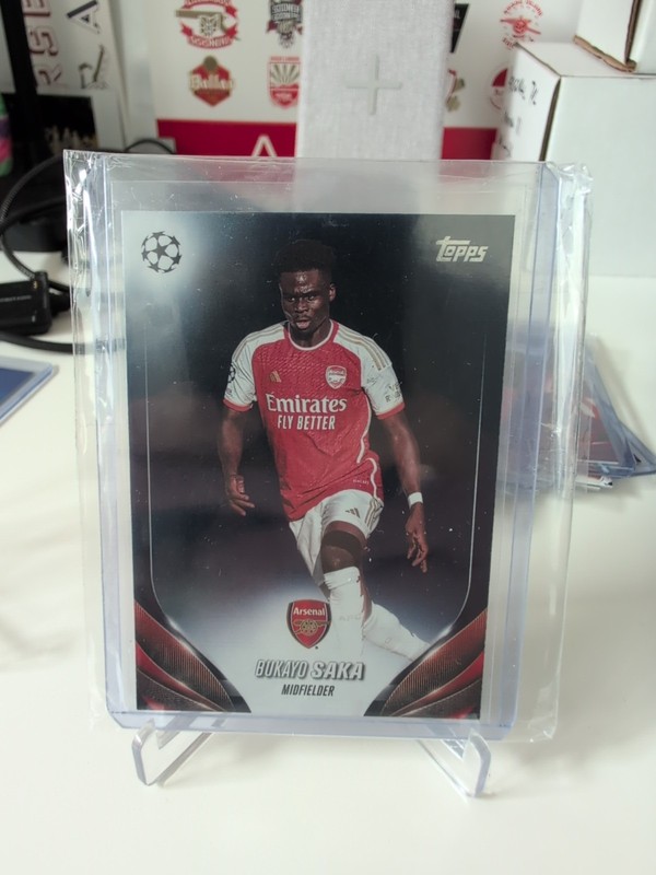 2023-24 Topps UEFA Club Competitions Bukayo Saka Navy Blue /250 Arsenal England