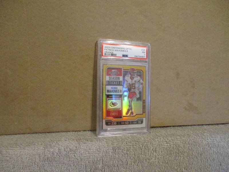 2023 PANINI CONTENDERS OPTIC PATRICK MAHOMES II #26 ORANGE PRIZM 38/50 PSA 7 NM