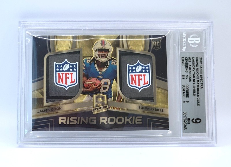 2022 Spectra James Cook Rising Rookie Gold Vinyl Dual NFL Shield Logoman Tag 1/1