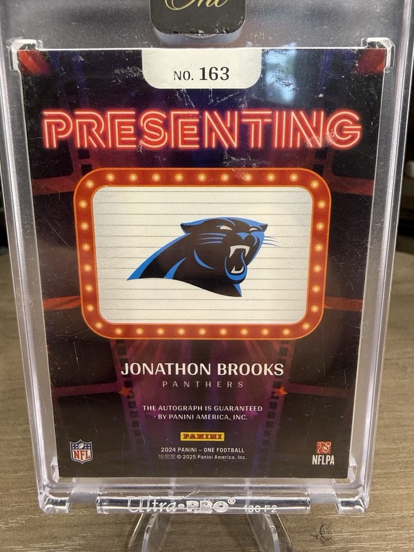 2024 Panini One Presenting Encased Jonathon Brooks Auto 8/10 view 2