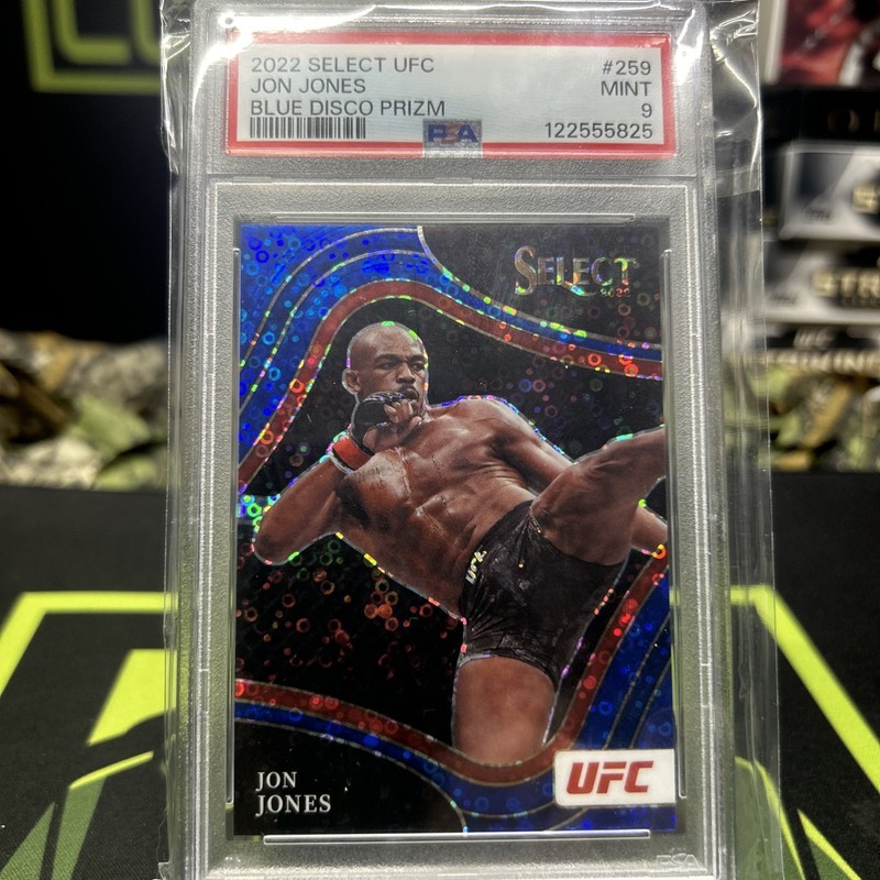2022 Panini Select UFC - Octagonside Jon Jones #259 Blue Disco Prizm 35/49 PSA 9