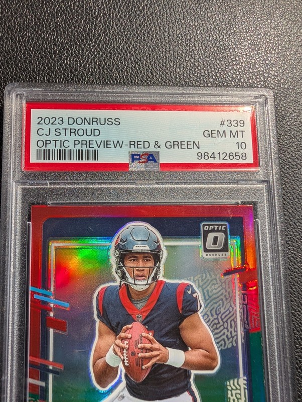 2023 Panini Donruss - C.J. Stroud 339 Optic Preview Red & Green Prizm (RC)PSA 10 view 2