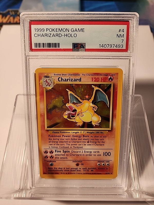 Pokemon 1999 Base Set Charizard #4 Unlimited Holo Rare PSA 7
