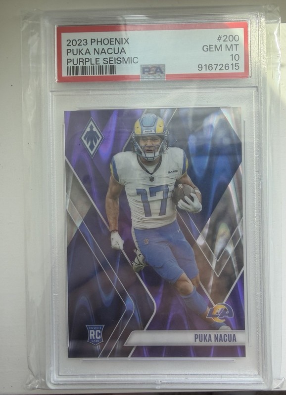 2023 Panini Phoenix - Rookies Puka Nacua #200 Purple Seismic /125 (RC) PSA 10
