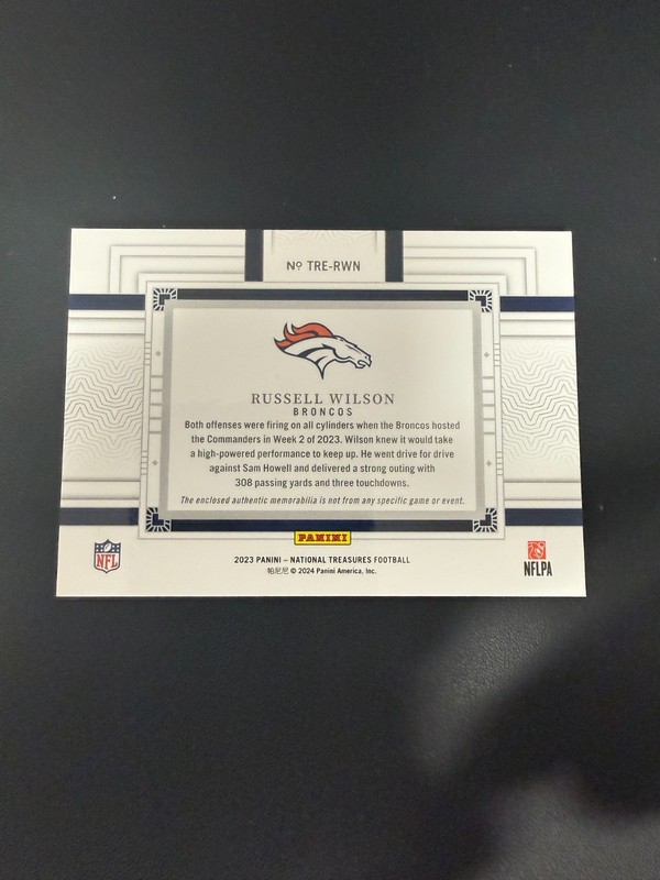 2023 Panini National Treasures Russell Wilson Tremendous Nike Patch 1/1 view 2