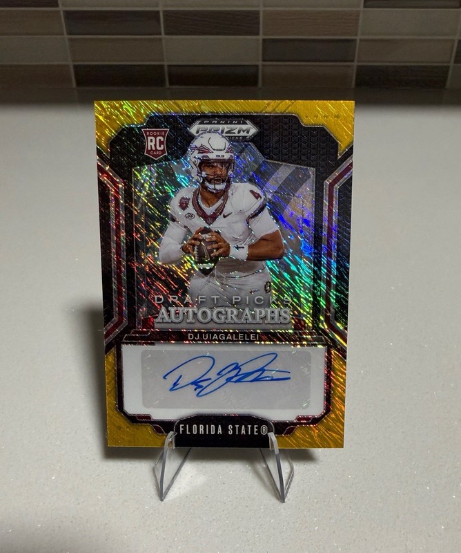 2025 Prizm Draft Picks Football DJ Uiagalelei Gold Shimmer Auto /15 Rookie RC