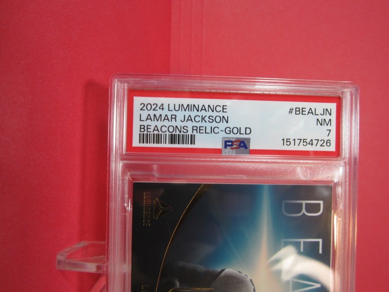 2024 PANINI LUMINANCE LAMAR JACKSON #BEALJN BEACONS RELIC-GOLD 41/50 PSA7 view 2
