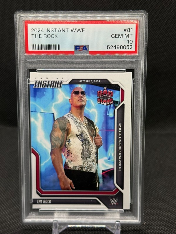 The Rock 2024 Panini Instant WWE No. 81 Bad Blood /100 PSA 10