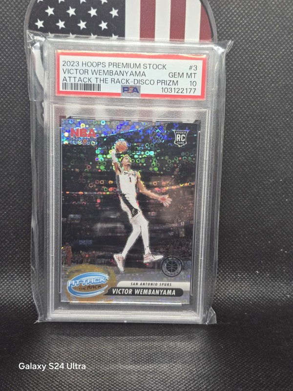 2023-24 HOOPS PREMIUM STOCK VICTOR WEMBANYAMA RC ATTACK THE RACK DISCO PSA 10