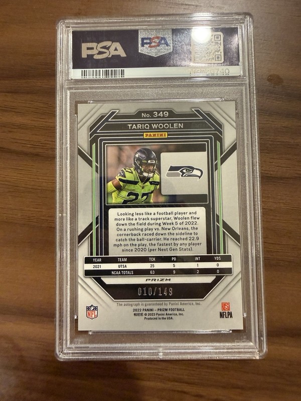 2022 Panini Prizm Rookies Tariq Woolen #349 Red Wave Prizm Autographs /149 PSA 9 view 2