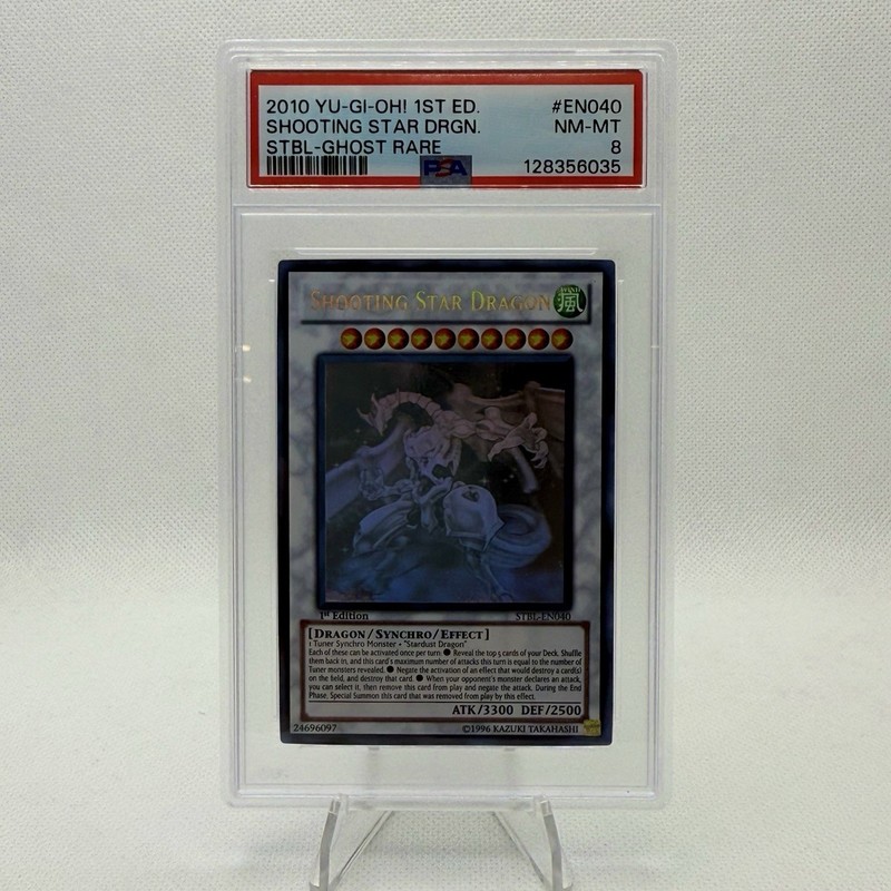 2010 YuGiOh Shooting Star Dragon 1st Edition Ghost Rare STBL-EN040 PSA 8