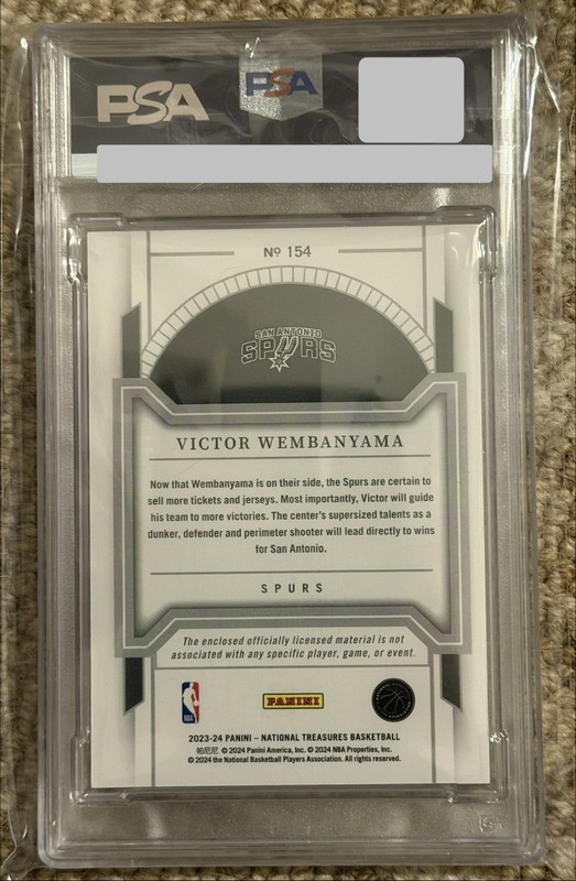 2023 National Treasures - Victor Wembanyama #154 Patch Pink /25 PSA 8 RC view 2