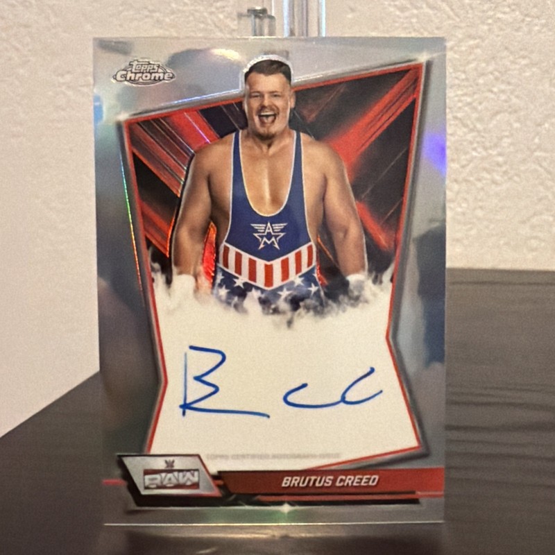 2026 Topps Chrome WWE - Brutus Creed - #RBA-BRU Red Brand Autograph On Card