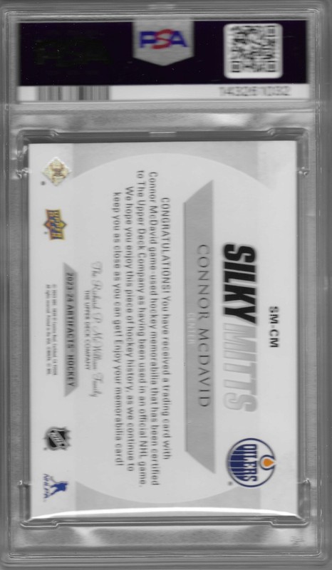 2023-24 Artifacts Silky Mits #SMCM Connor McDavid Patchbl PSA 7 view 2