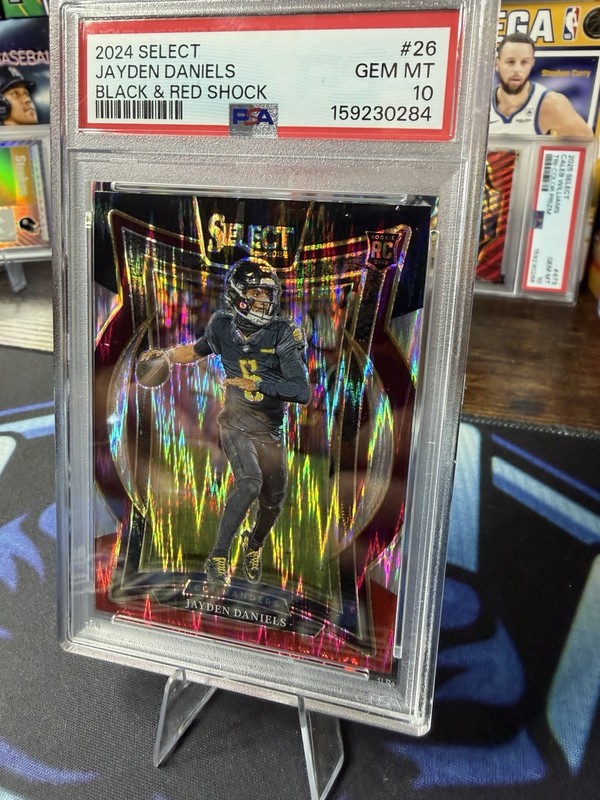 2024 Panini Select Concourse Jayden Daniels #26 Black & Red Shock Prizm PSA 10 view 2