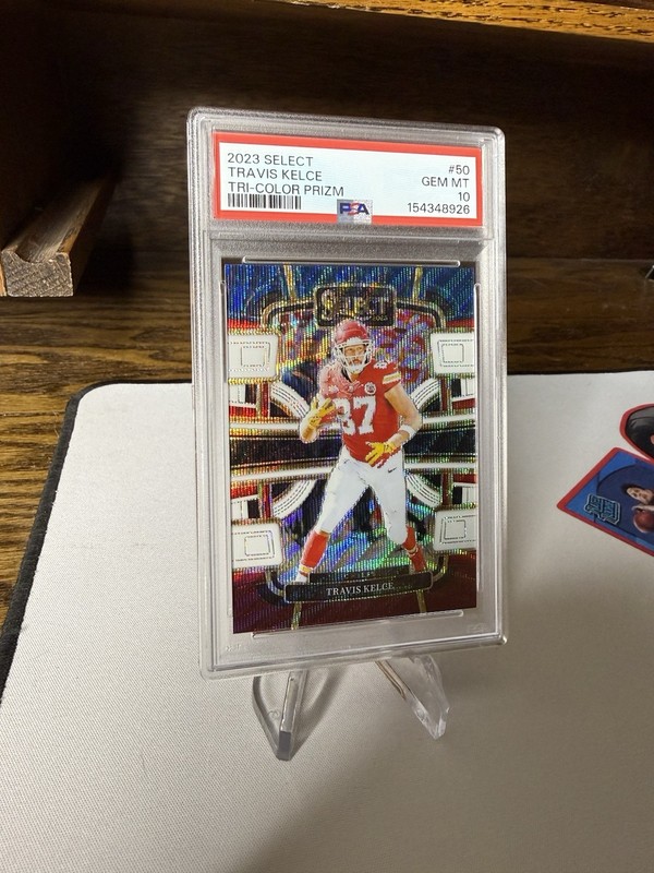 2023 Panini Select - Concourse Travis Kelce #50 Tri-Color Prizm /259 PSA 10 view 2