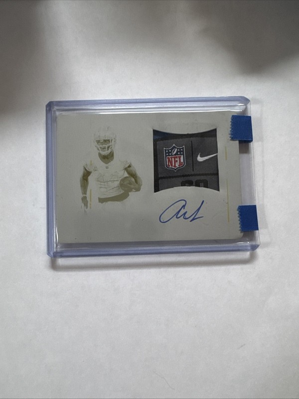 2025 National Treasures Amon Ra St Brown Laundry Tag Patch Auto 1/1 Plate CS-ASB