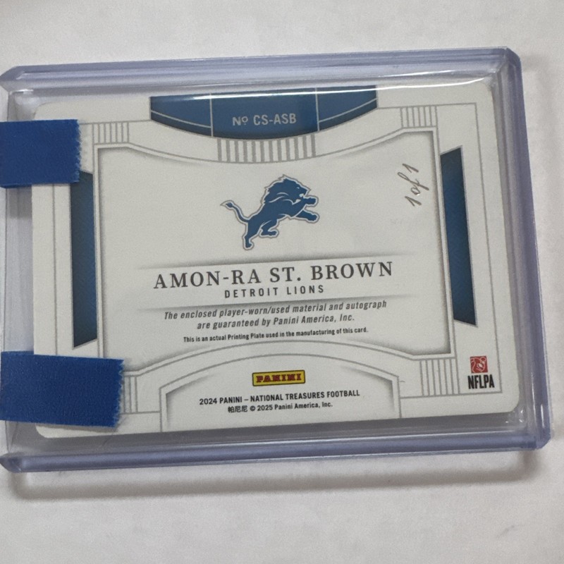 2025 National Treasures Amon Ra St Brown Laundry Tag Patch Auto 1/1 Plate CS-ASB view 2