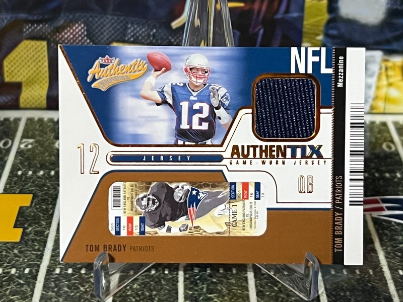 2004 Fleer Authentix Mezzanine JA-TB Tom Brady Game-worn Jersey Patch /75 view 2