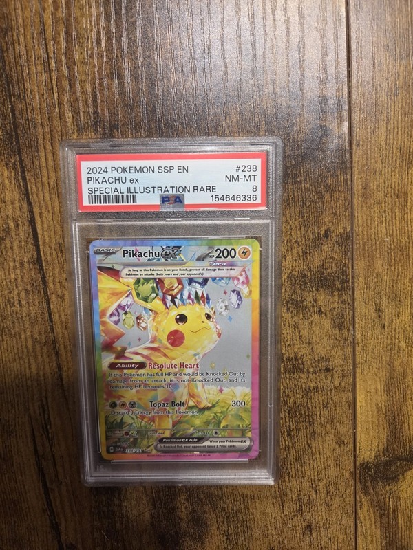 Pikachu ex 238/191 Sv08: Surging Sparks Holo PSA 8