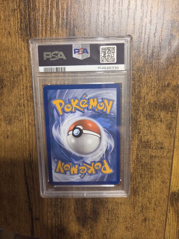 Pikachu ex 238/191 Sv08: Surging Sparks Holo PSA 8 view 2