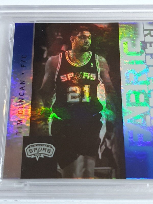 2005 Upper Deck Tim Duncan TRIPLE #PATCH BLUE /20 Worn Jersey - PSA 9 (POP 1) view 2