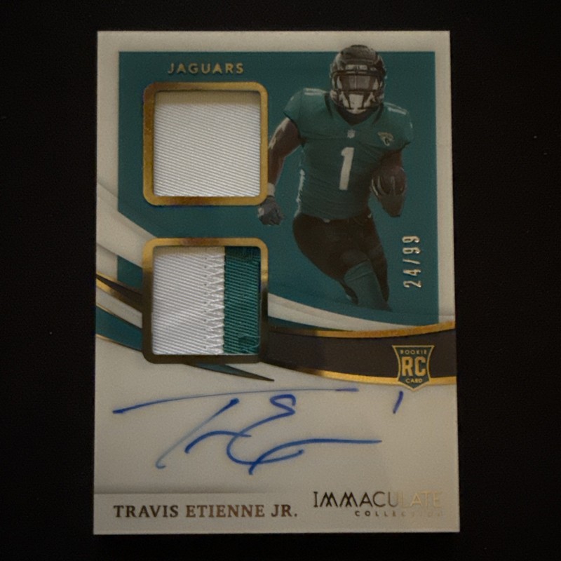 2021 Immaculate Rookie Dual Patch Autograph #ISP-TE TRAVIS ETIENNE JR. RC /99 view 2