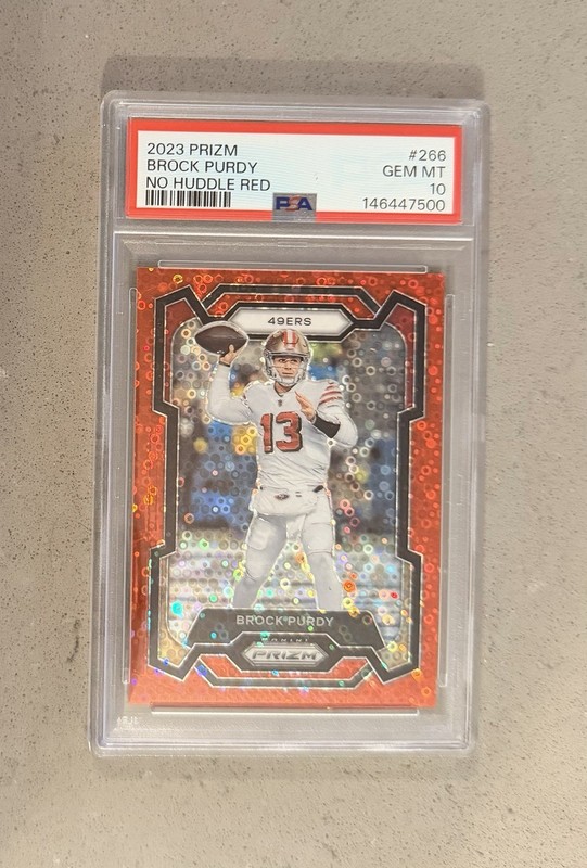 2023 PRIZM BROCK PURDY NO HUDDLE RED PSA 10 /70
