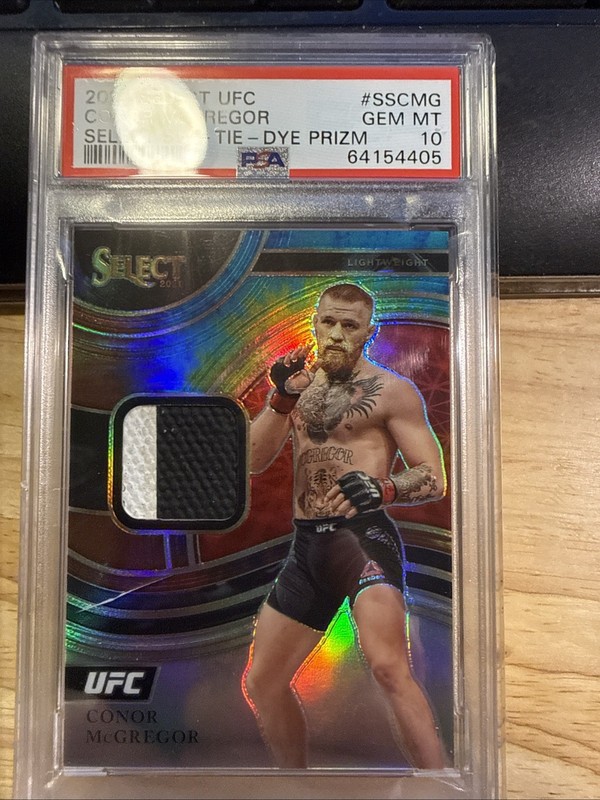 Conor McGregor 2021 Panini Select UFC Swatch Tie Dye Prizm  MatRelic PSA 10 9/25