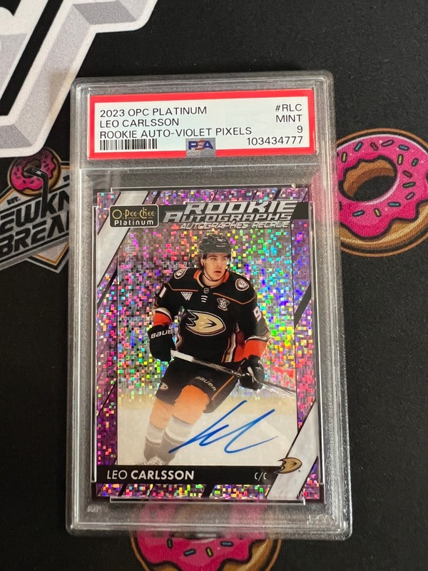 2023-24 OPC Platinum Leo Carlsson Violet Pixels Auto /99 PSA 9