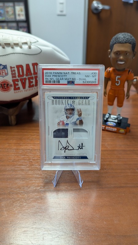 2016 National Treasures Rookie Gear Dak Prescott /99 PSA 8 AUTO SMUDGE Cowboys