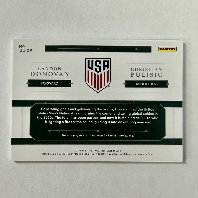 2018 Panini National Treasures Christian Pulisic/Landon Donovan Dual Auto 20/35 view 2