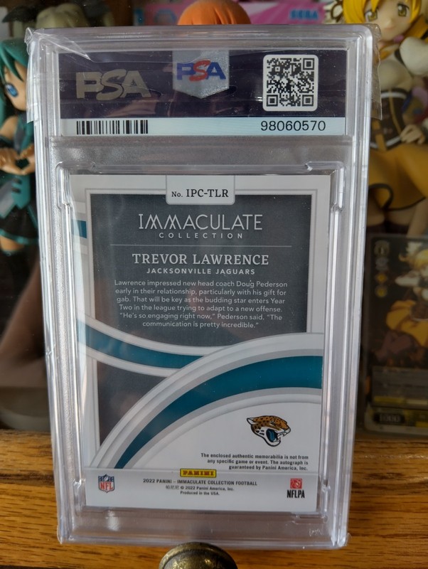 2023 Immaculate Trevor Lawrence /25 Patch Auto PSA 8 view 2