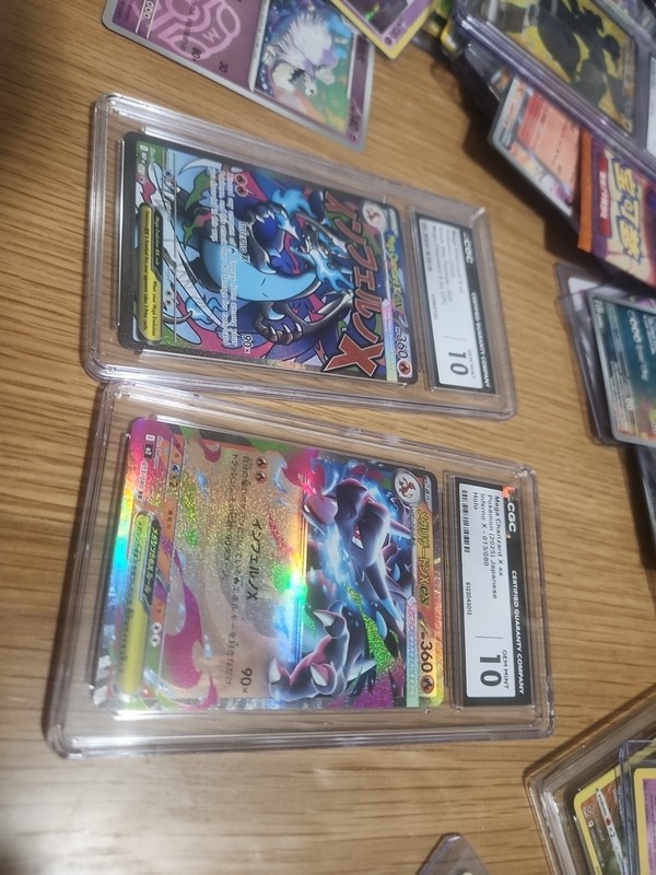 Selling Black Charizards PSA 10s