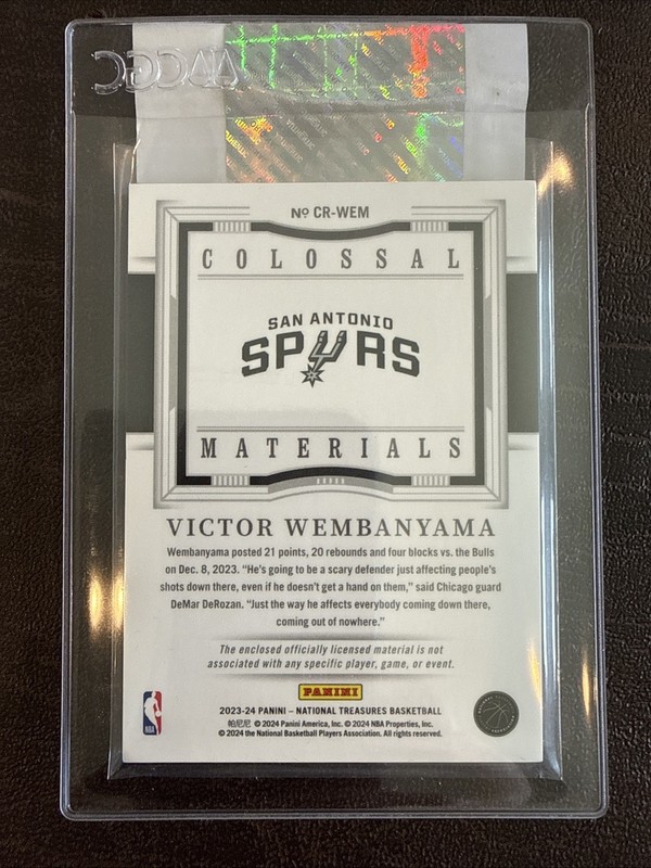 2023-24 Panini Ntl Treasures - Colossal Rookie Materials Victor Wembanyama 75/99 view 2