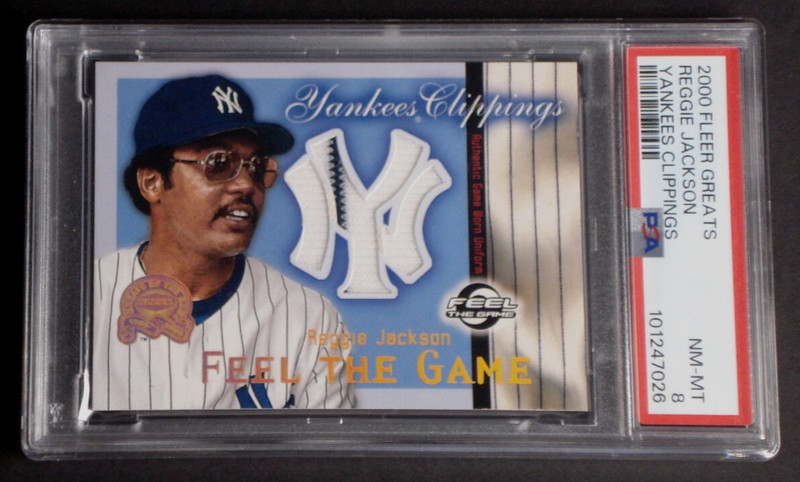 REGGIE JACKSON 2000 FLEER GREATS YANKEES CLIPPINGS GAME USED WORN PATCH PSA 8