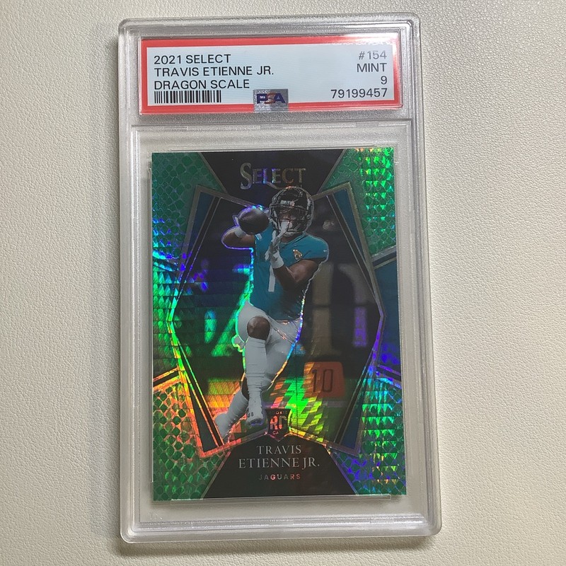Travis Etienne Jr 2021 Panini Select Dragon Scale Rookie PSA 9 Jags/ Saints