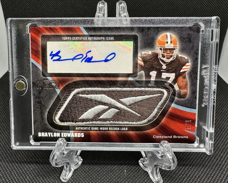 2009 Topps Unique Braylon Edwards Game Worn Reebok Logo Patch Auto 1/1