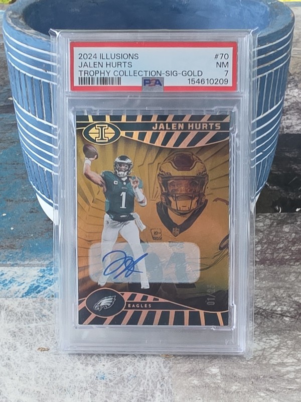 Jalen Hurts 2024 Panini Illusions #70 Trophy Collection Gold Auto #/25 PSA 7