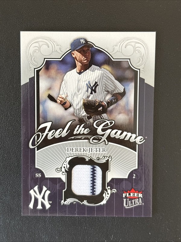 A2006 Fleer Ultra Feel The Game Derek Jeter Game Used Jersey Card #FG-DJ Yankees