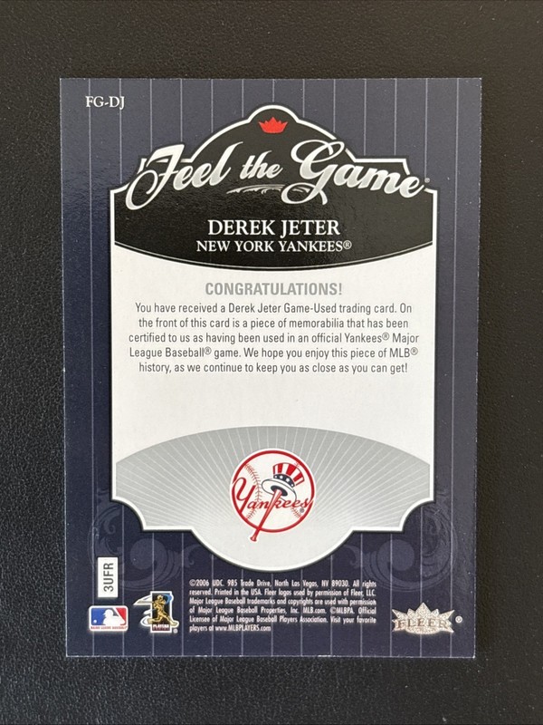 A2006 Fleer Ultra Feel The Game Derek Jeter Game Used Jersey Card #FG-DJ Yankees view 2